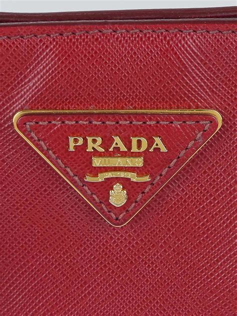 real and fake prada logo|prada triangle logo plaque.